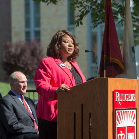 Felicia McGinty speaks at a podium