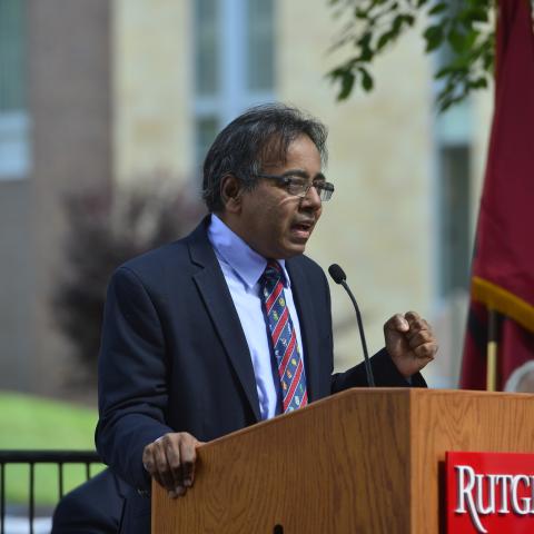 Dr. Edward Ramsamy speaks at a podium