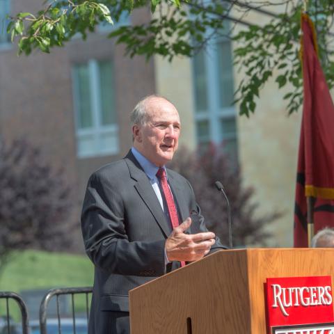 Rutgers President Robert Barchi speaks at a podium