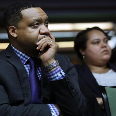 David E. Jones and Zaneta Rago-Craft listen to speaker Opal Tometi during event